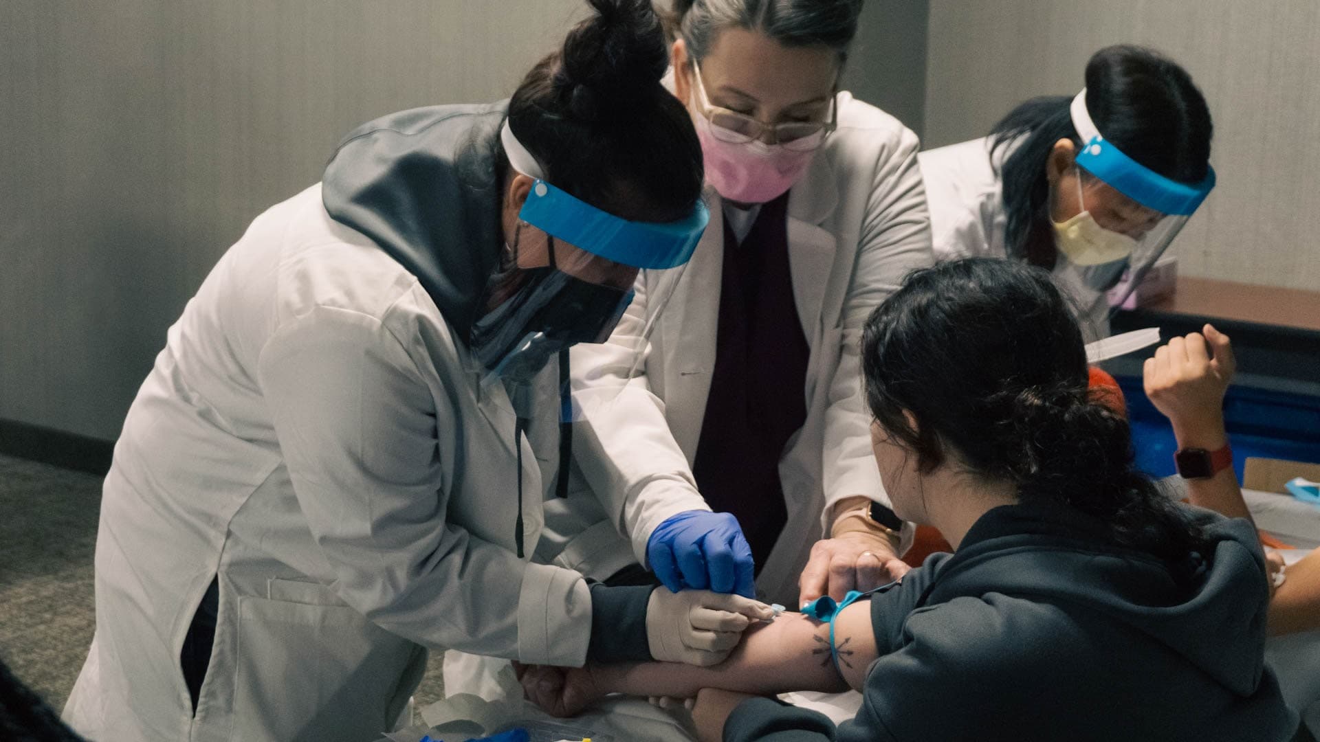 Blood draw with assistant