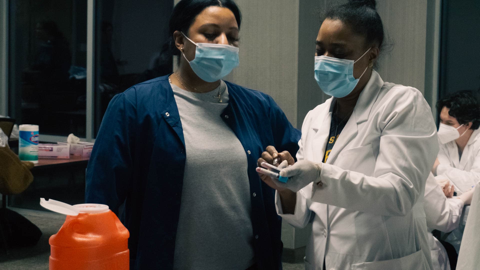 Tube examination with assistant (2)